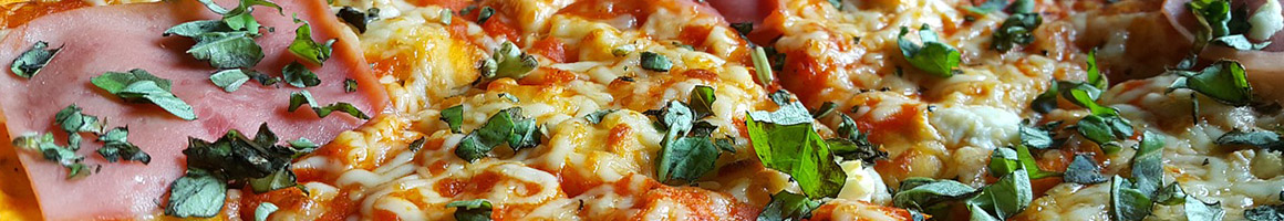 Eating Pizza at La Trattoria Pizza restaurant in New York, NY.